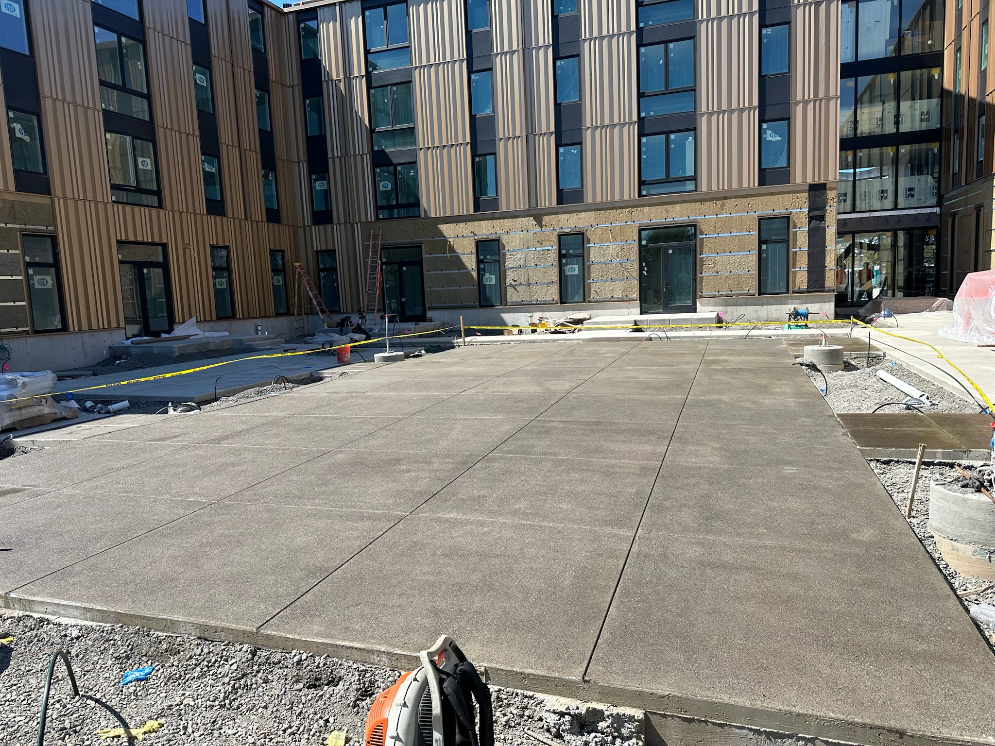 Sand Finish Concrete Slab Enhances Building Entry at NE Portland, OR